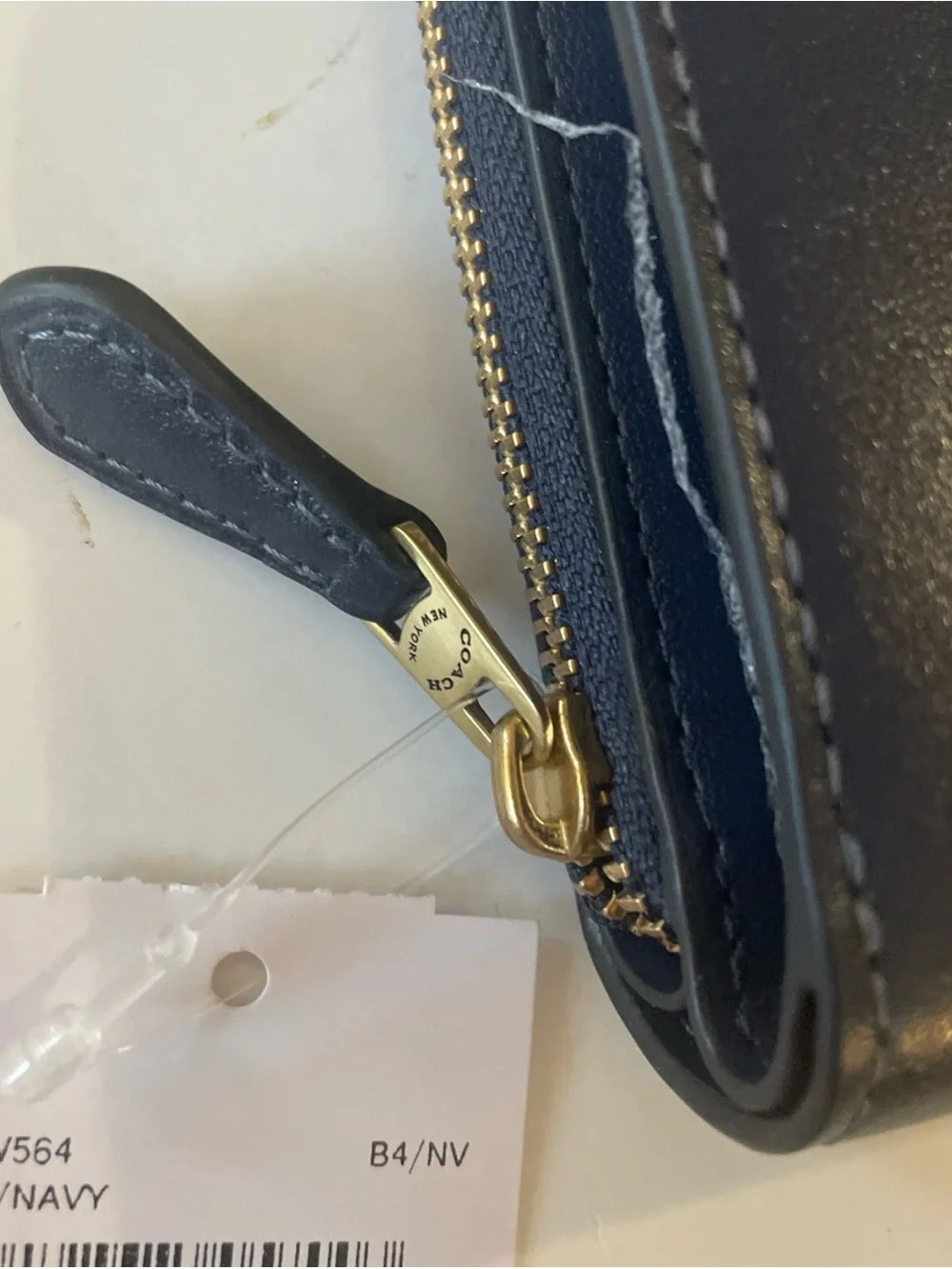 Coach compact zip